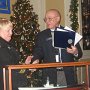 Past Council President Steve Gravereaux presenting an award for dedication to Sea Cadet CO, LCdr Jennifer Stannard.