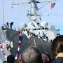 Friends and family USS Winston S. Churchill (DDG 81) as it pulls into its homeport of Norfolk after 9 month deployment. 